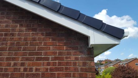 Before image showing rotten and damaged fascias before replacement