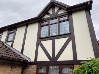 Fascia and soffit installation with matching white uPVC boards for seamless finish