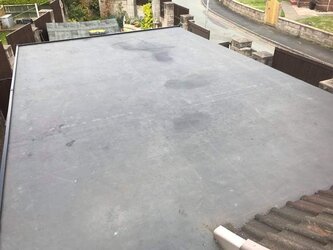 Single storey home extension with professionally installed flat rubber roofing
